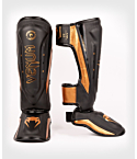 Shinguards Venum Elite Evo black, bronze